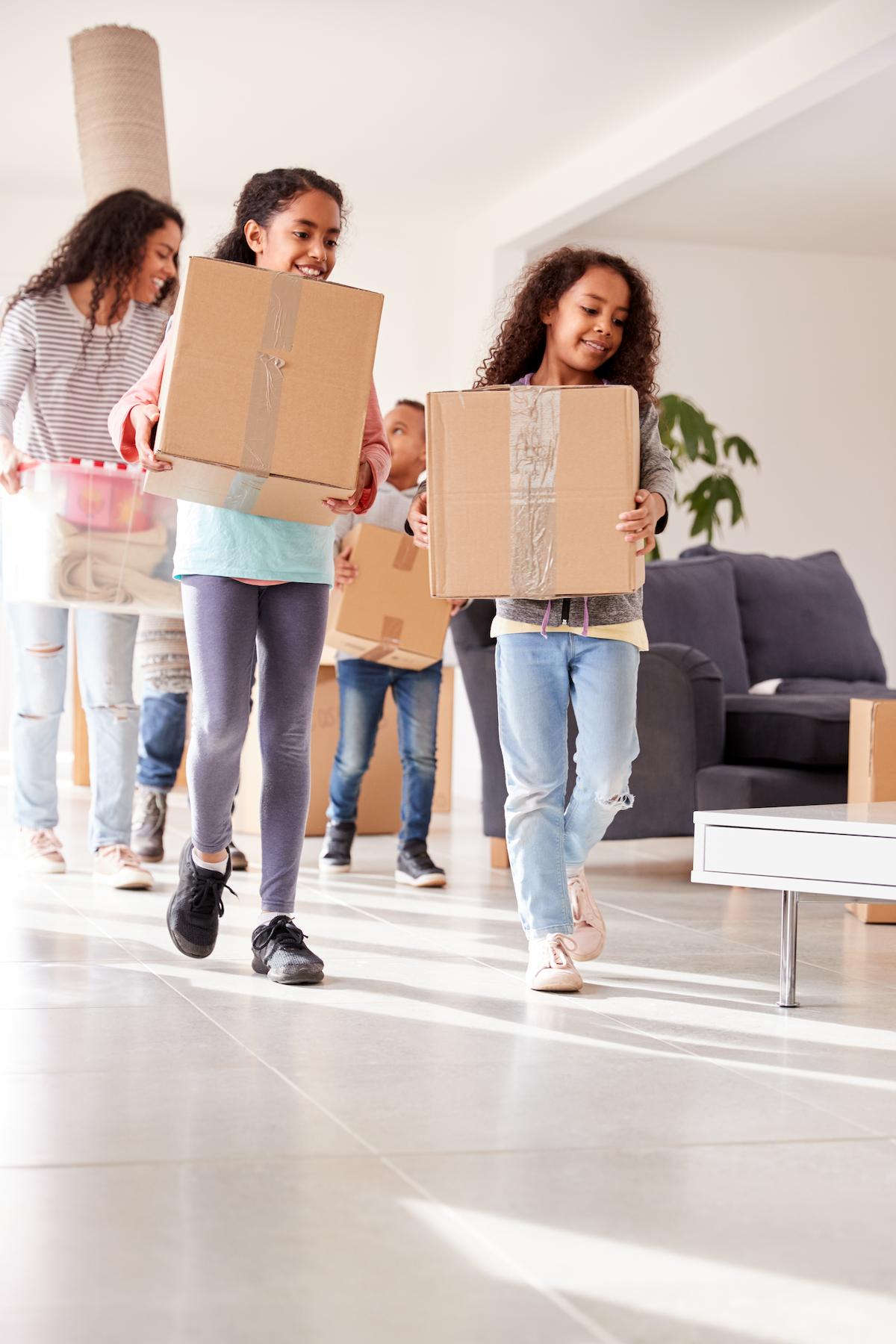 A family moving into their new home